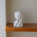 Sculpture visage céramique Oito fille tressée